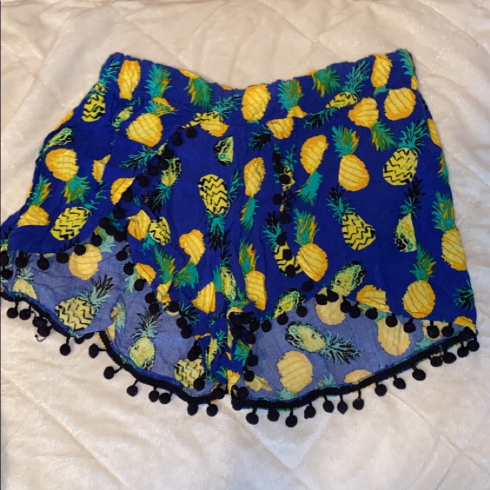 Blue fabric shorts with pineapples